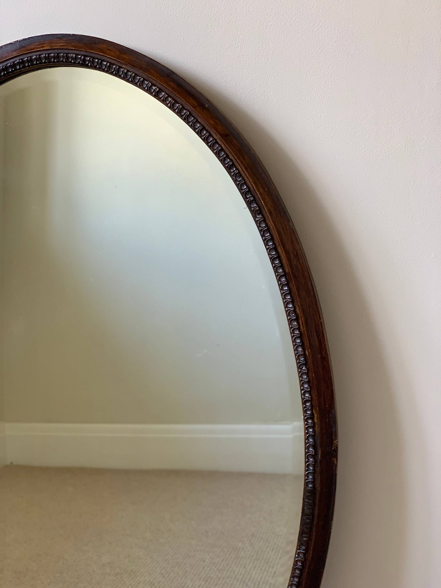 Antique late Victorian oval bevelled mirror