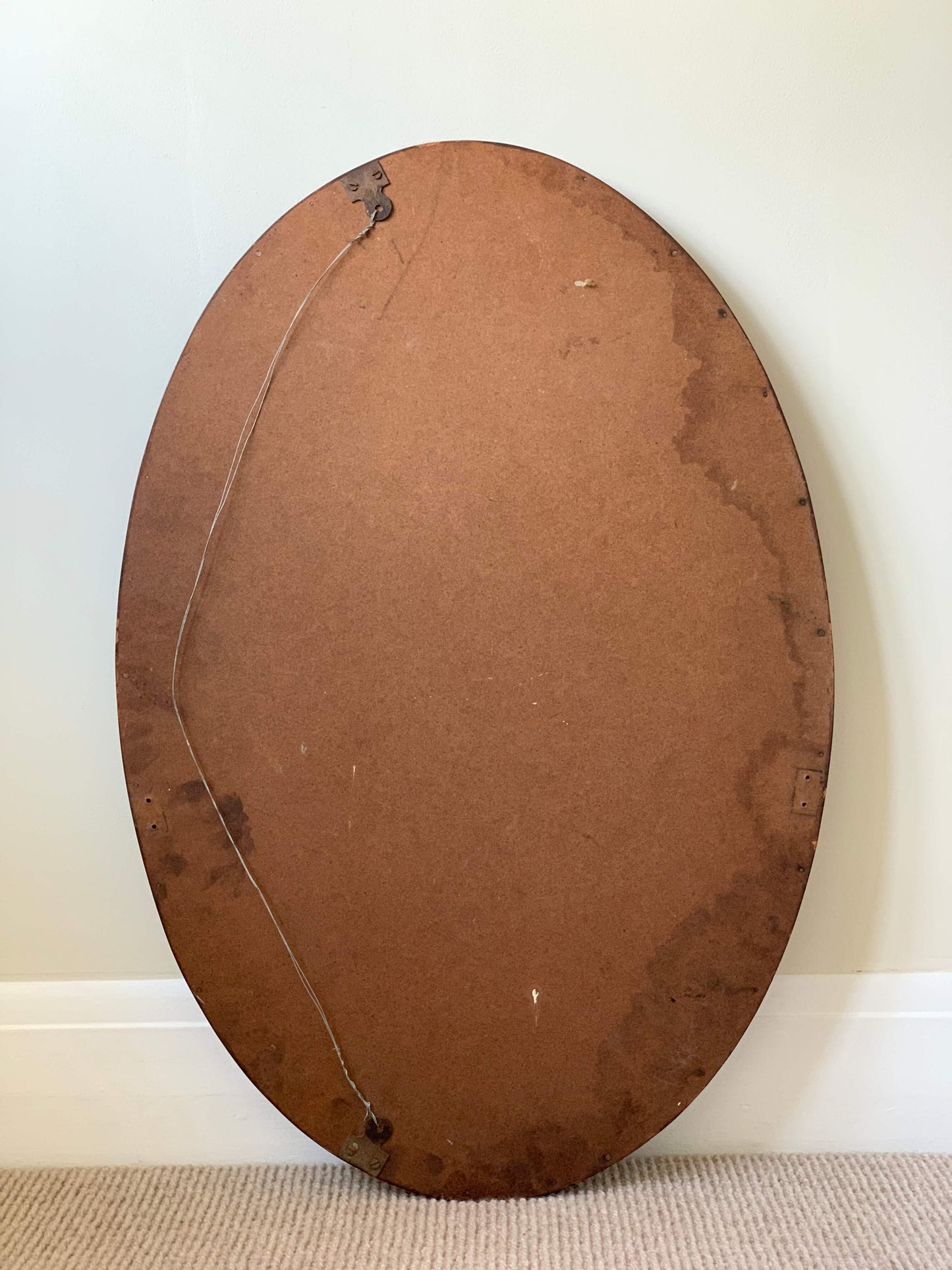 Antique late Victorian oval bevelled mirror