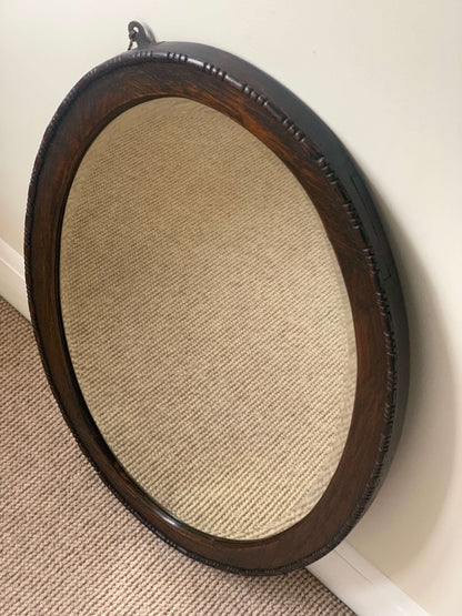 Antique dark oak bobbin detailed oval bevelled mirror