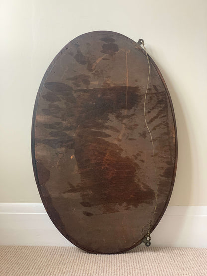 Antique dark oak bobbin detailed oval bevelled mirror