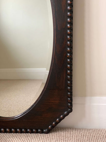 Antique oak octangular bobbin mirror