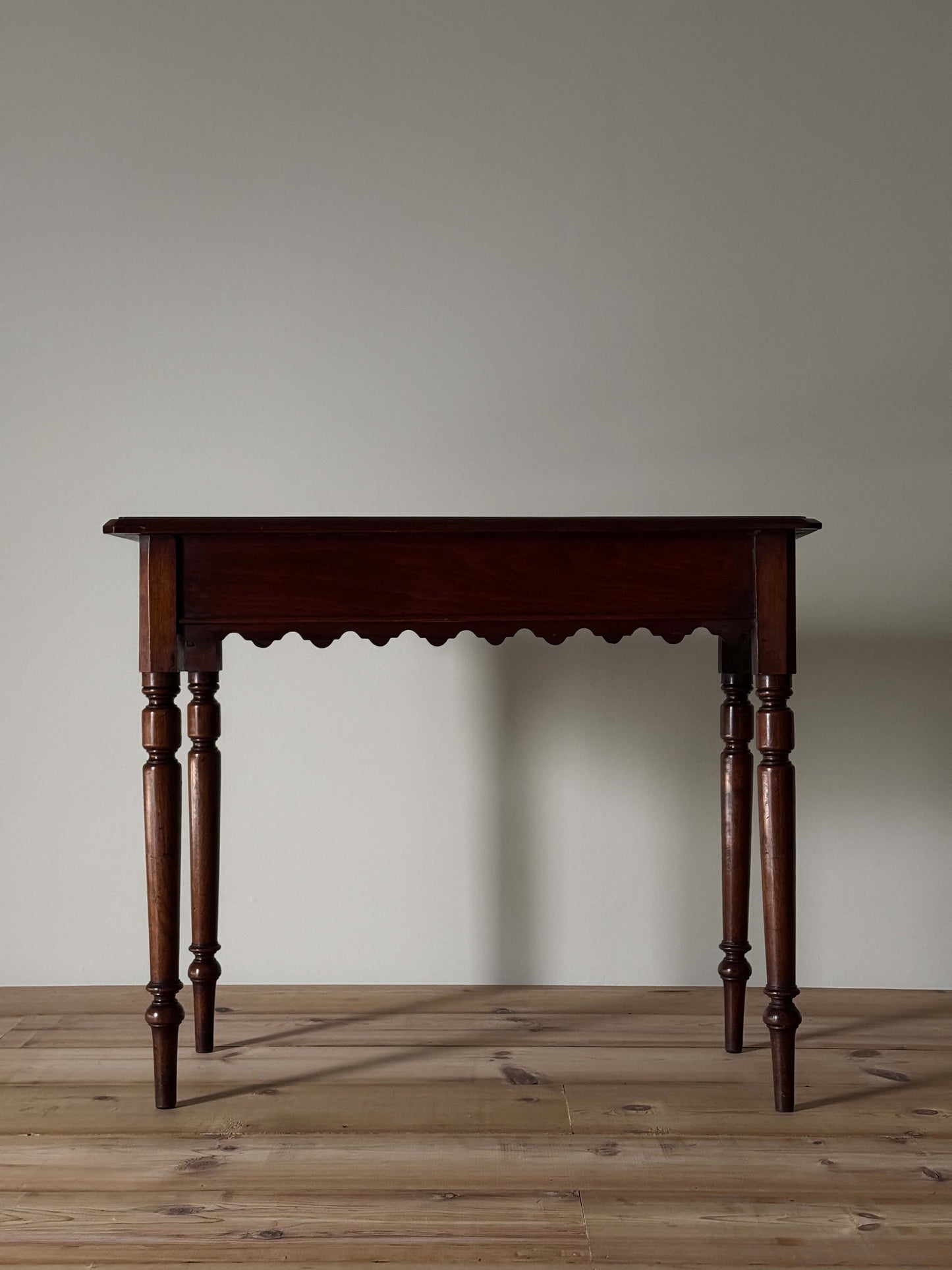 Antique walnut scalloped console table with drawer