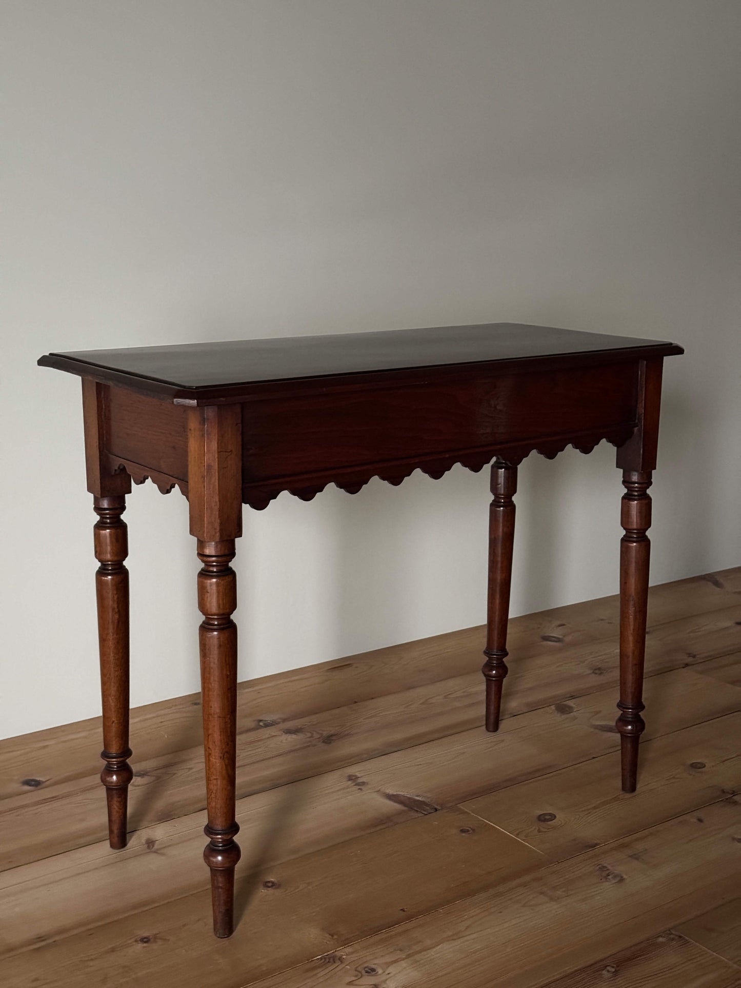 Antique walnut scalloped console table with drawer