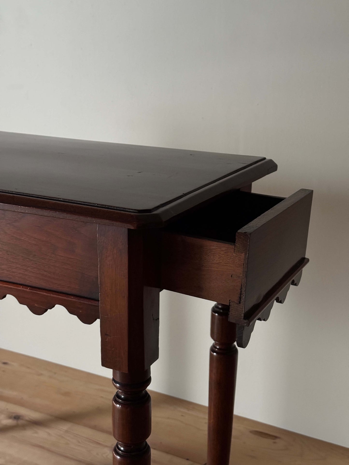 Antique walnut scalloped console table with drawer