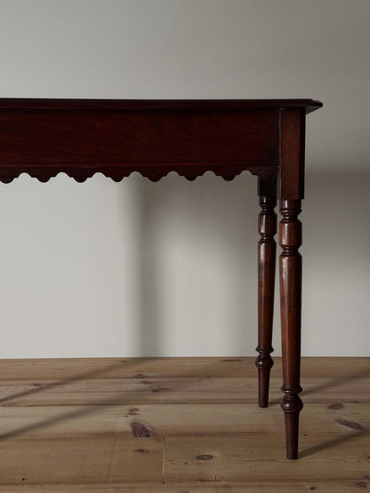 Antique walnut scalloped console table with drawer