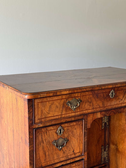 George II walnut cross-banded kneehole desk
