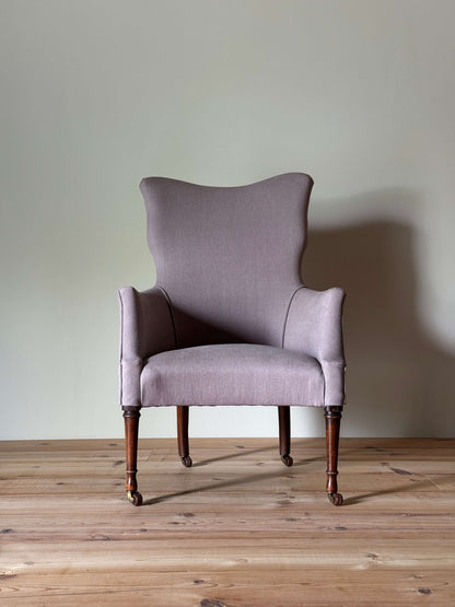Victorian armchair raised on castors