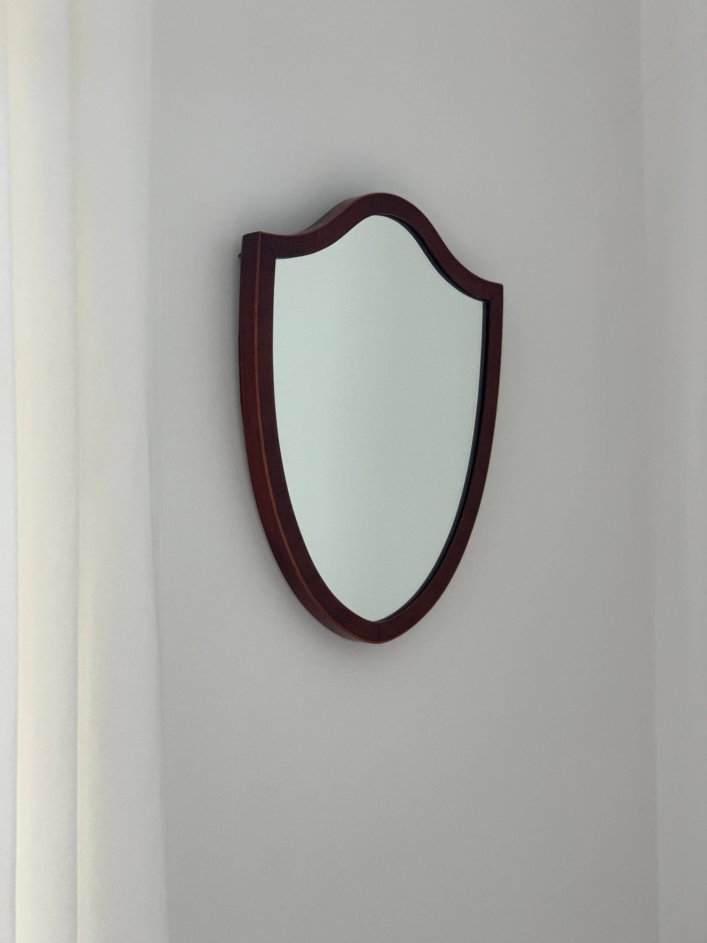 Antique shield mirror