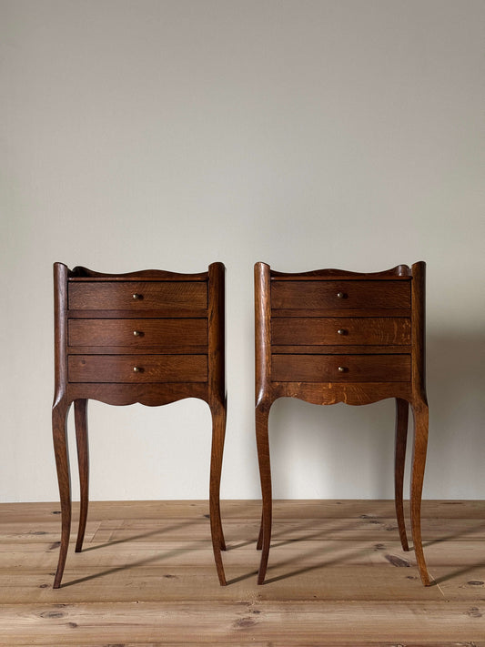 Pair of vintage French bedside tables with three drawers