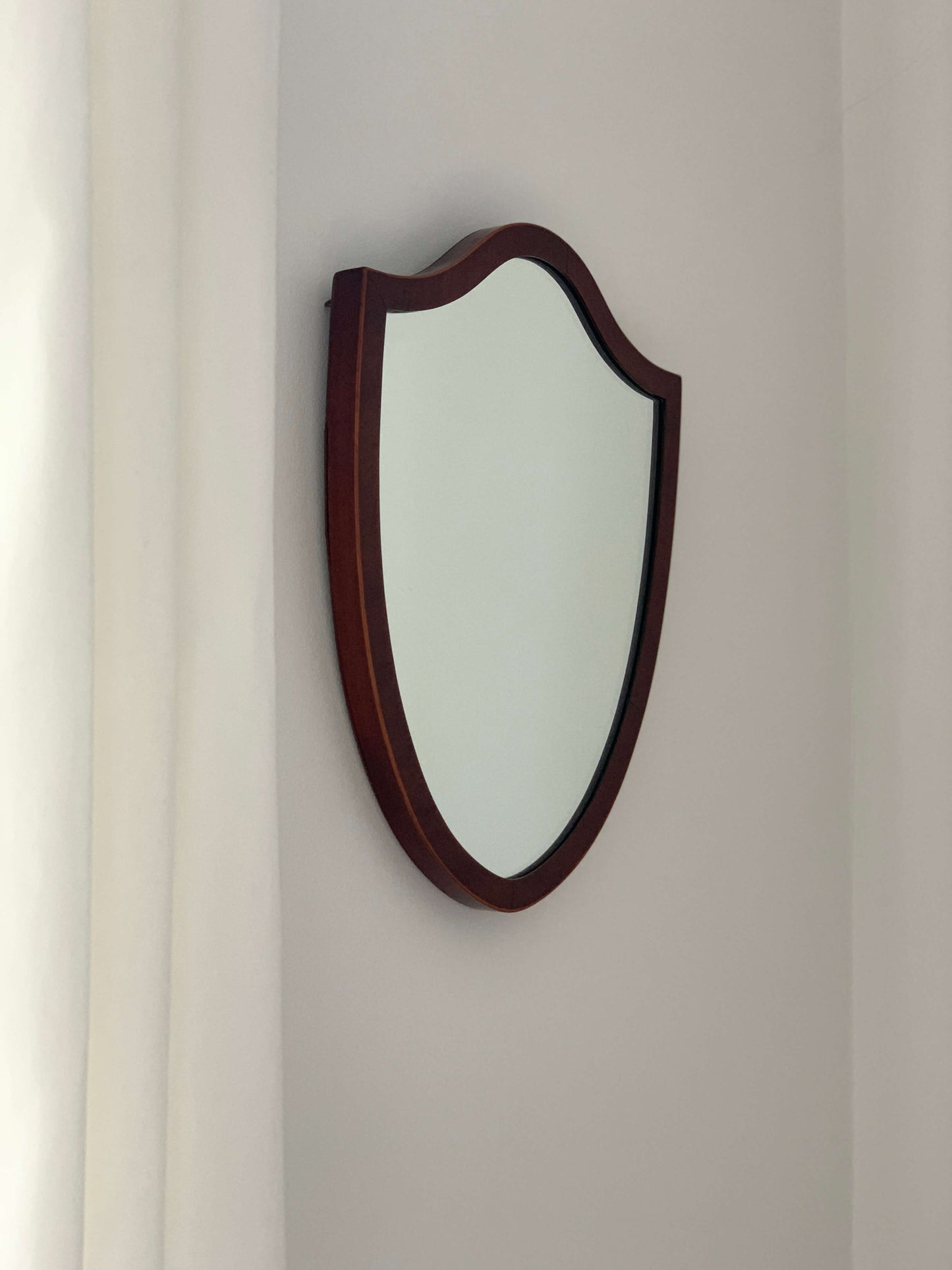 Antique shield mirror