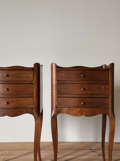 Pair of vintage French bedside tables with three drawers