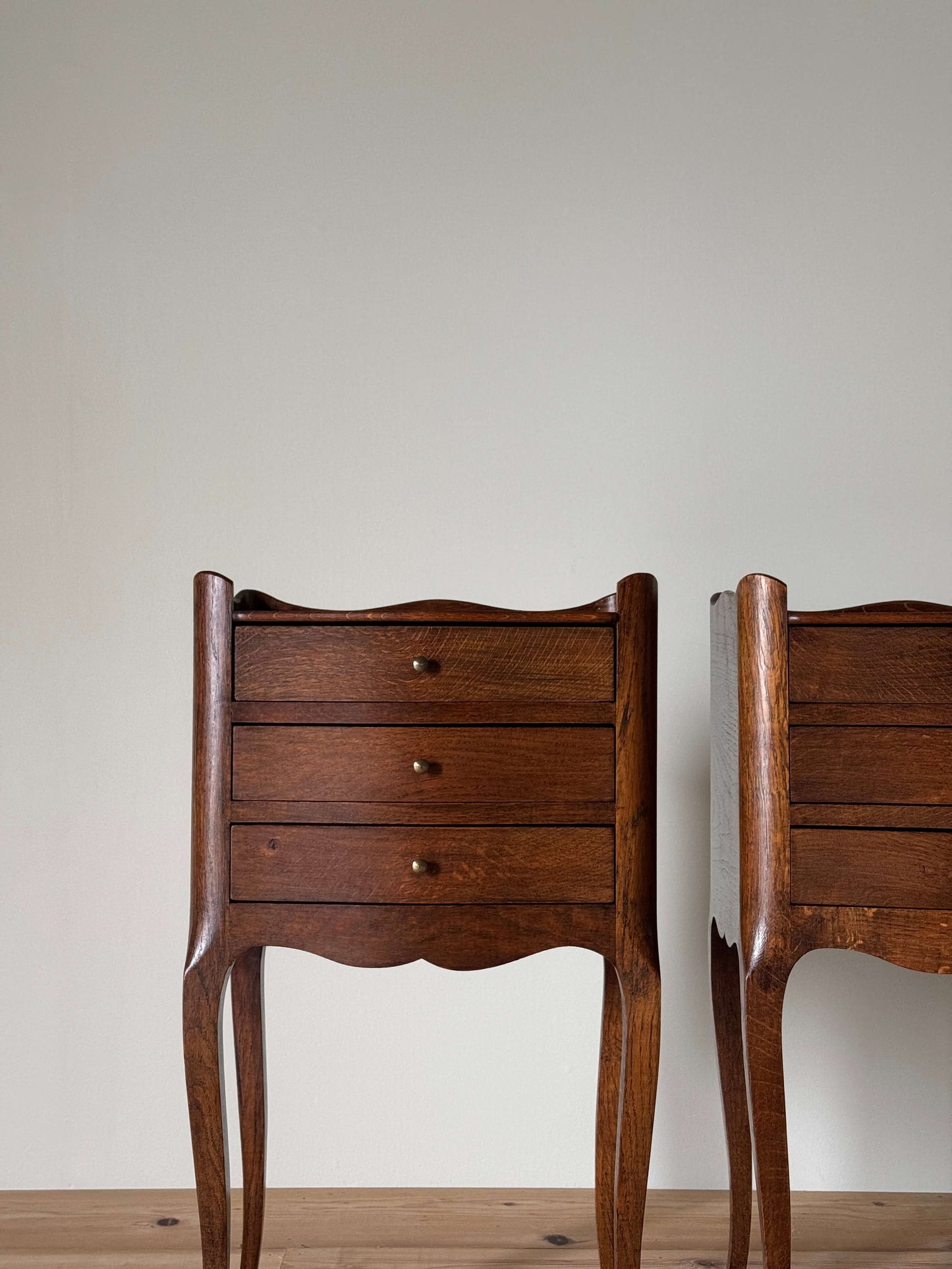 Pair of vintage French bedside tables with three drawers