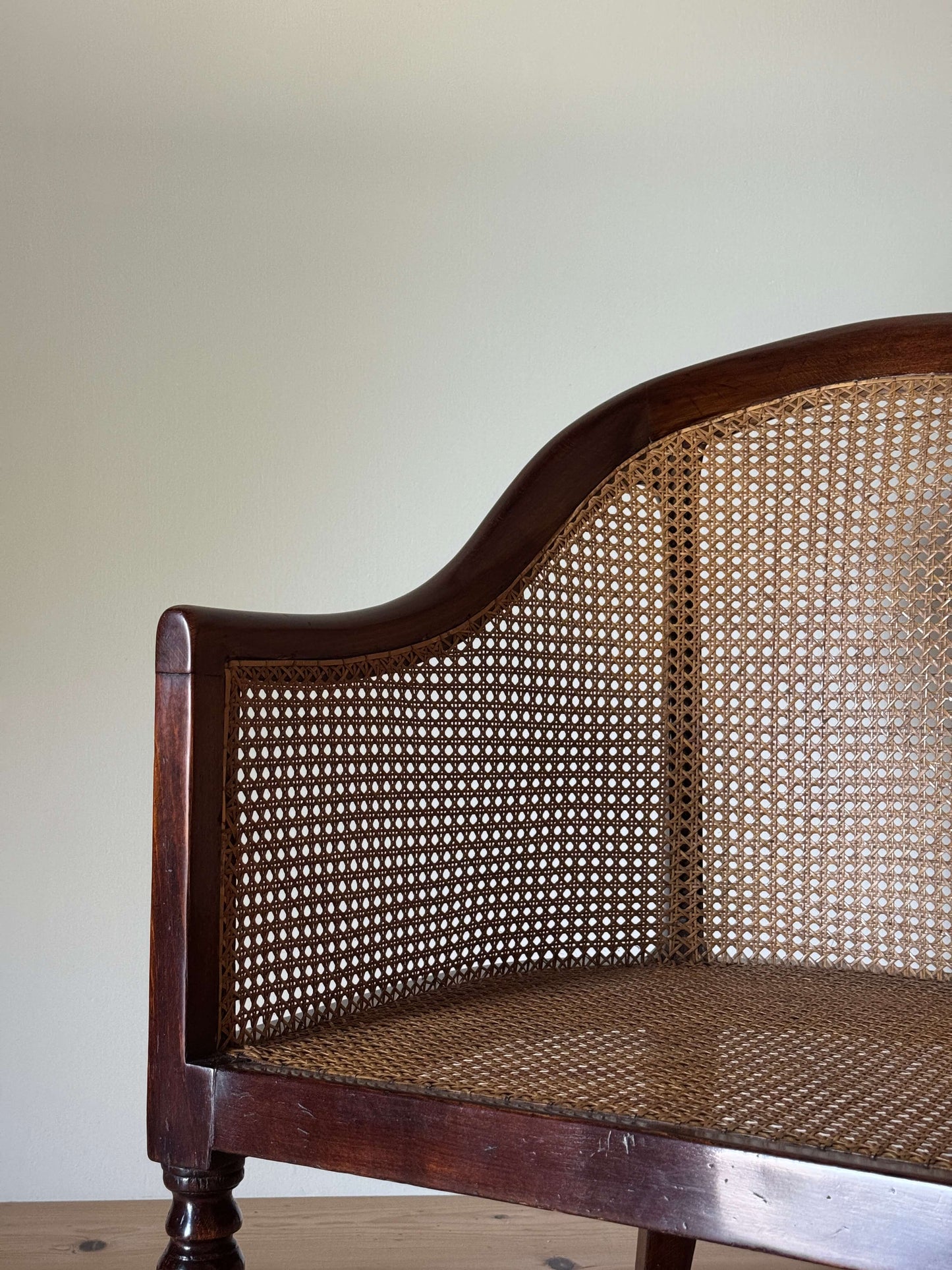 Antique beech bergere chair on castors