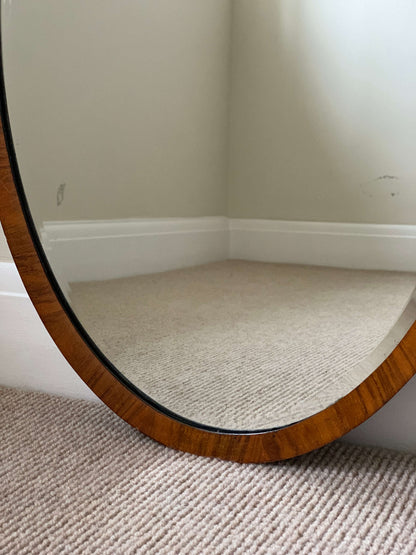 Antique oval walnut veneered mirror