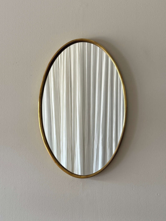 French mid-century oval brass mirror