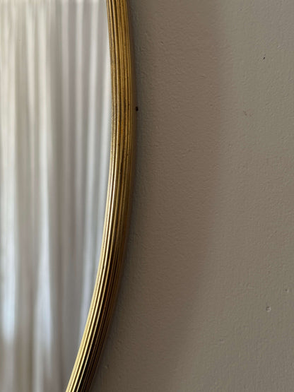 French mid-century oval brass mirror