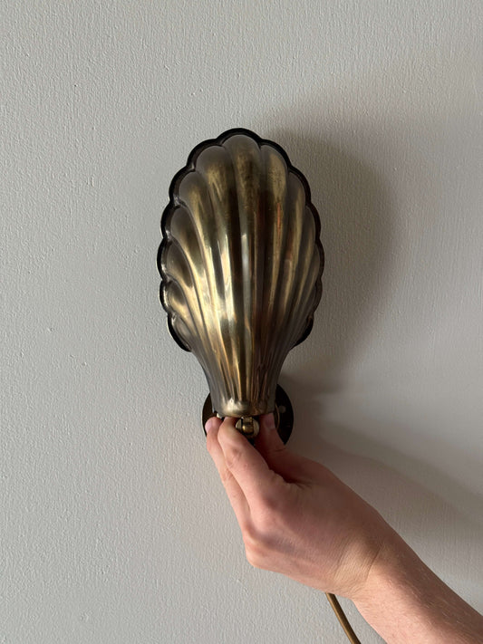 Vintage brass clam wall lights