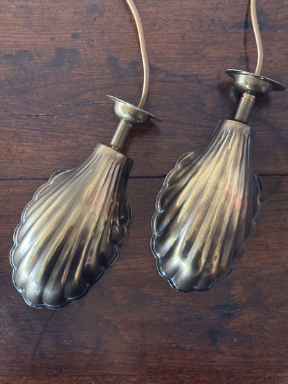 Vintage brass clam wall lights