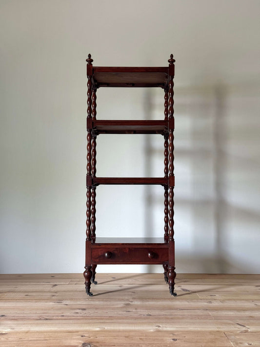 Victorian mahogany bobbin whatnot on castors