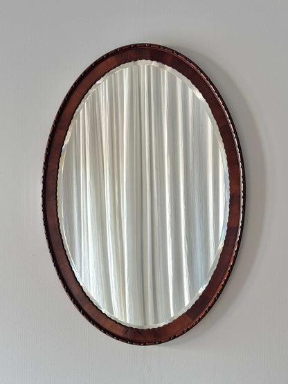 Antique mahogany scalloped mirror