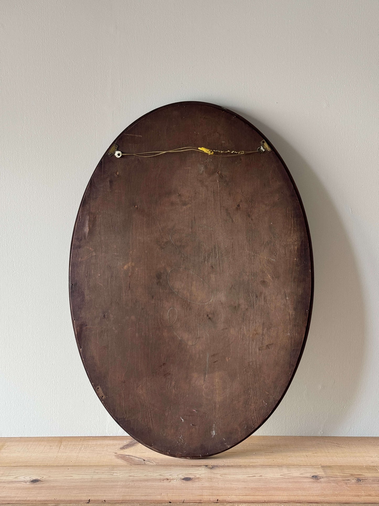 Antique mahogany scalloped mirror