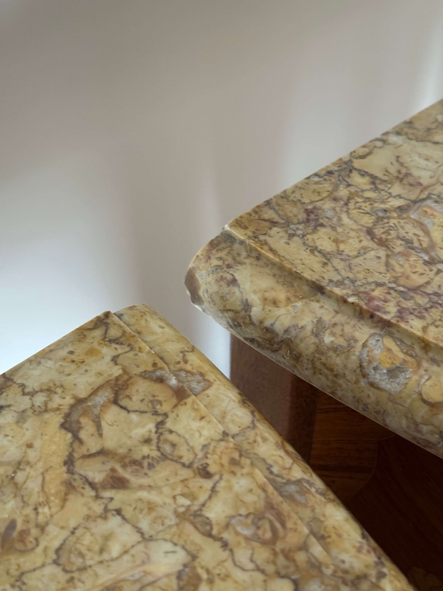 Pair of French 20th-century bedside tables with marble tops