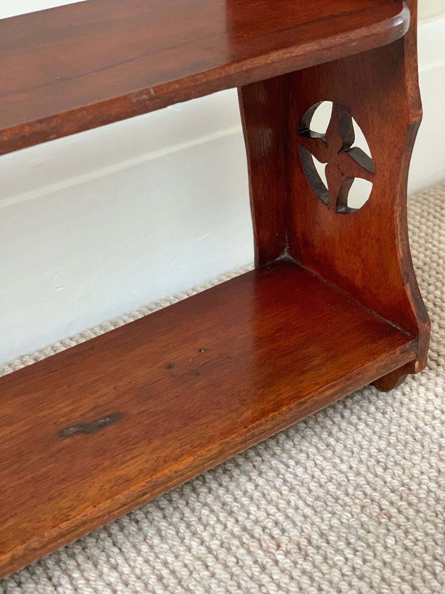 Antique folk wall-mounted shelf with scallop detailing