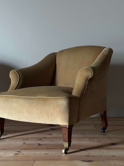 ON HOLD Pair of Edwardian armchairs on casters