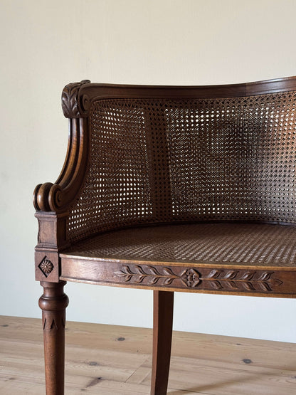 Vintage French bergère cane armchair