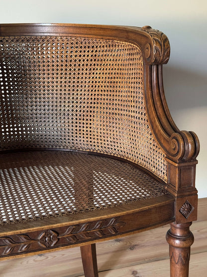 Vintage French bergère cane armchair