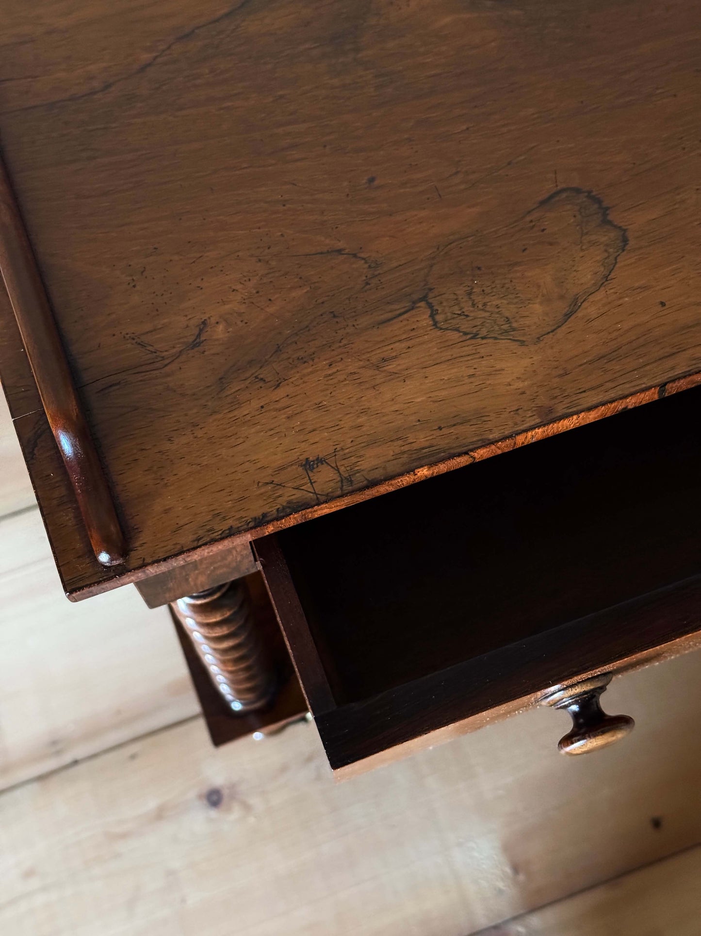Early Victorian rosewood whatnot on castors