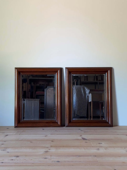 Pair of 20th-century mahogany mirrors