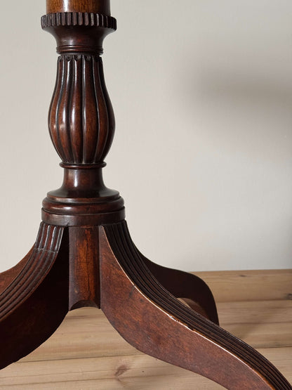 Early Victorian mahogany occasional table on reeded legs