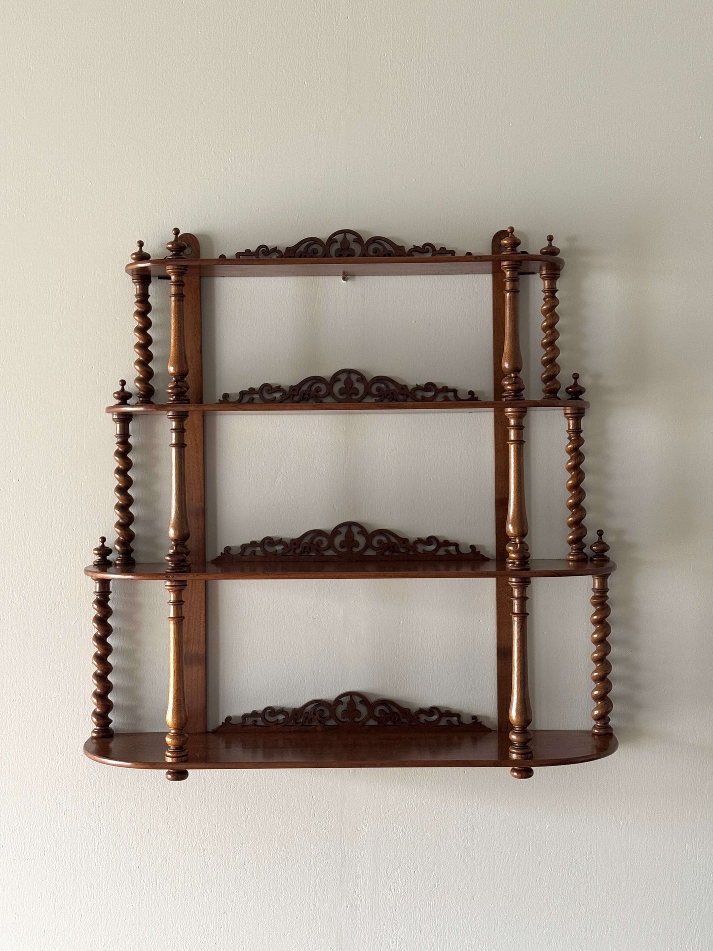 Antique walnut barley twist wall-mounted shelf