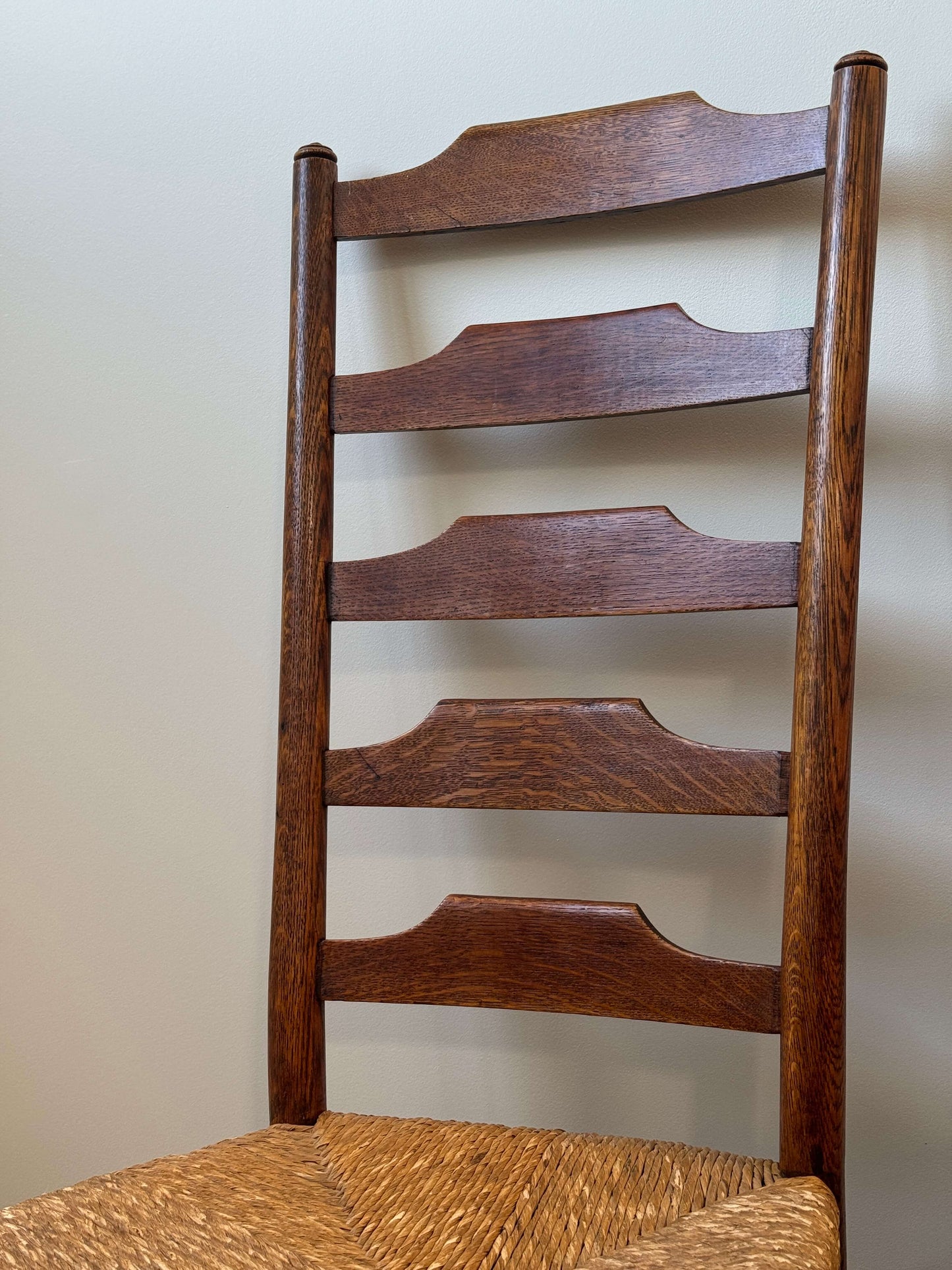 Set of four late 19th-century ladderback rush dining chairs