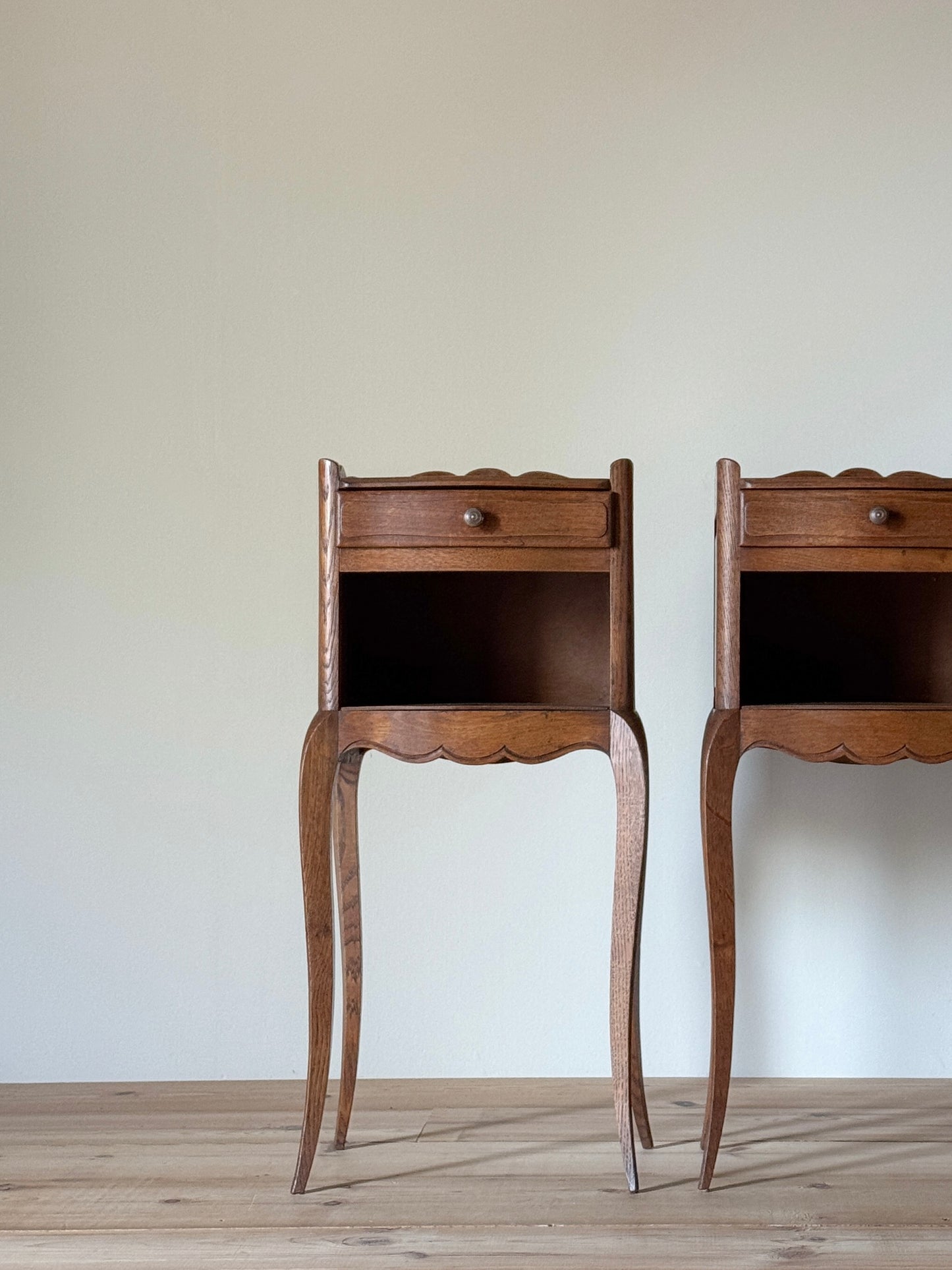 Pair of petite French bedside tables