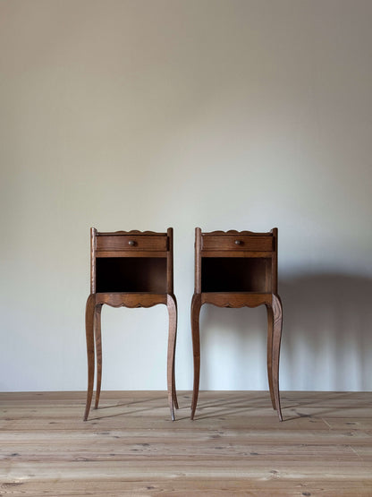 Pair of petite French bedside tables