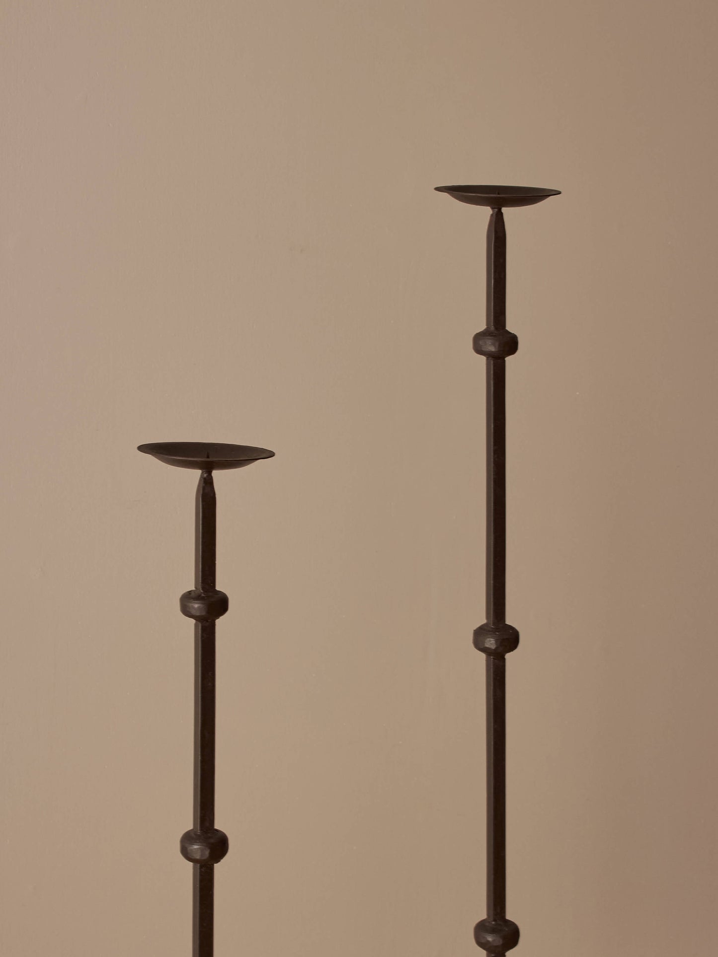 Pair of vintage wrought iron candlesticks