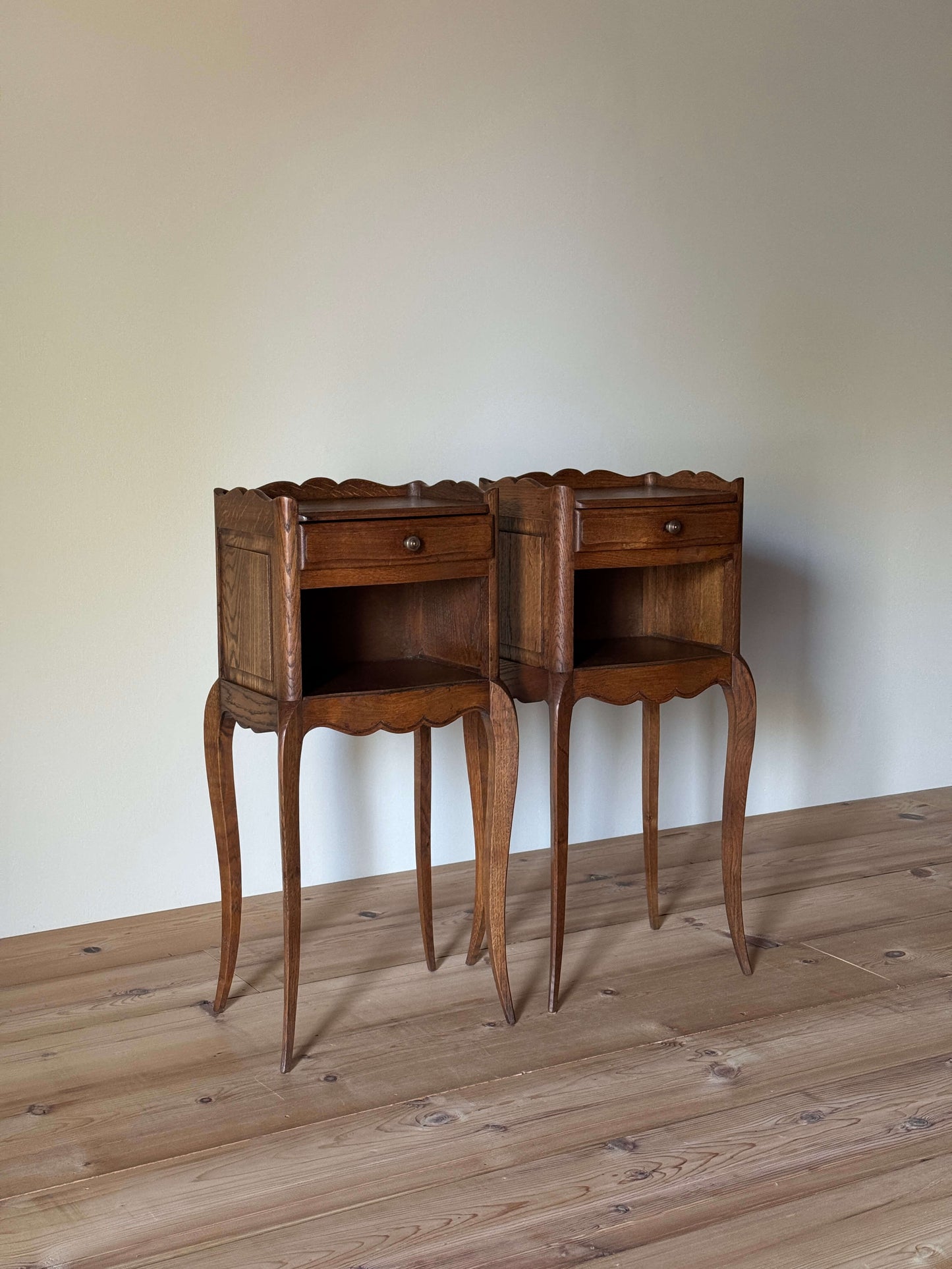 Pair of petite French bedside tables