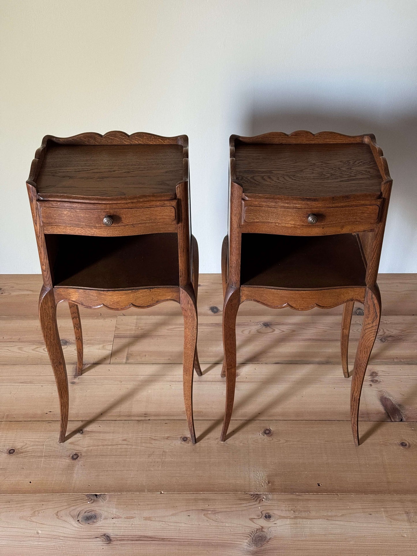 Pair of petite French bedside tables