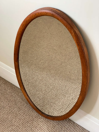 Antique light oak oval mirror