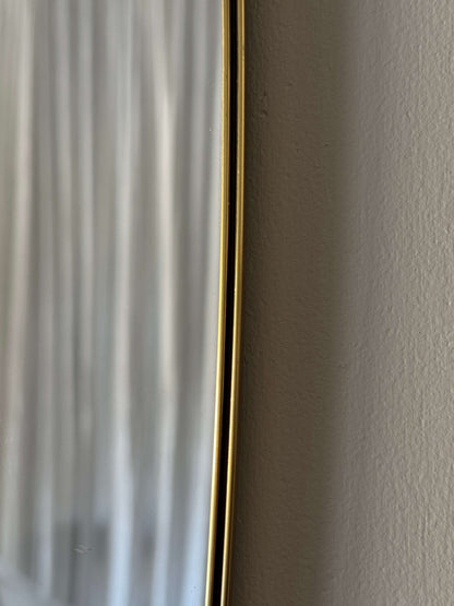 Mid-century brass pill mirror