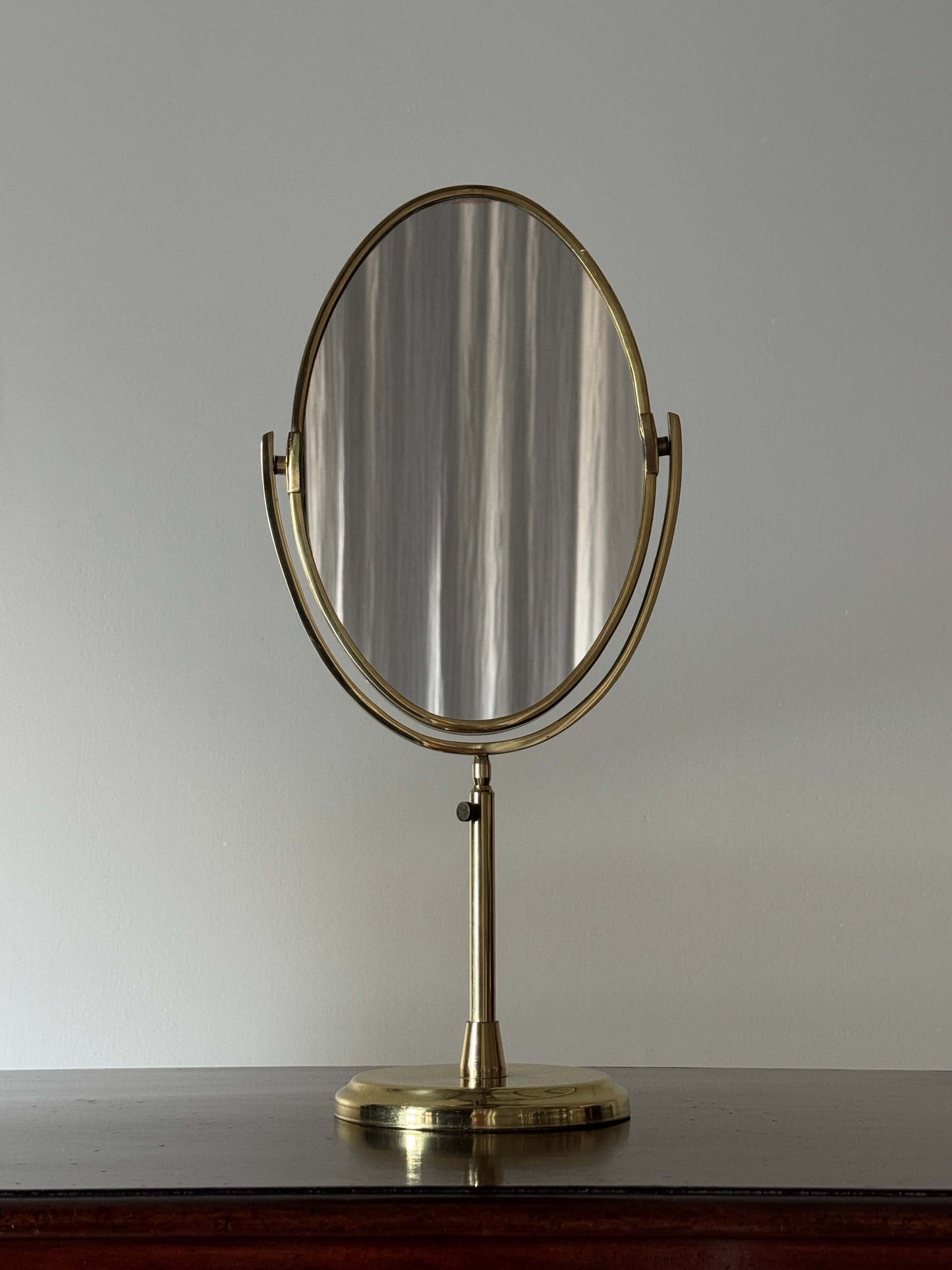 Small mid-century brass vanity mirror