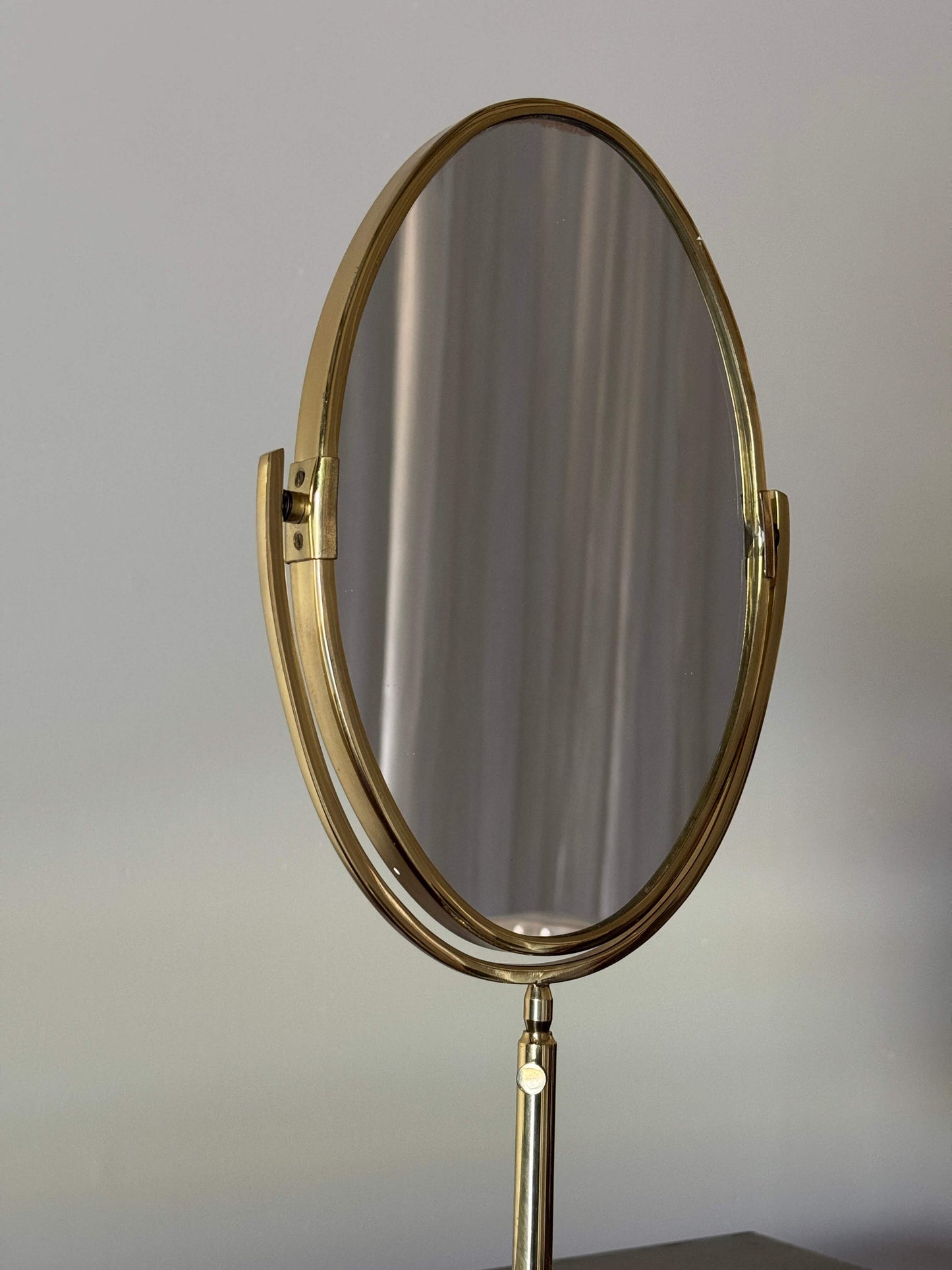 Small mid-century brass vanity mirror