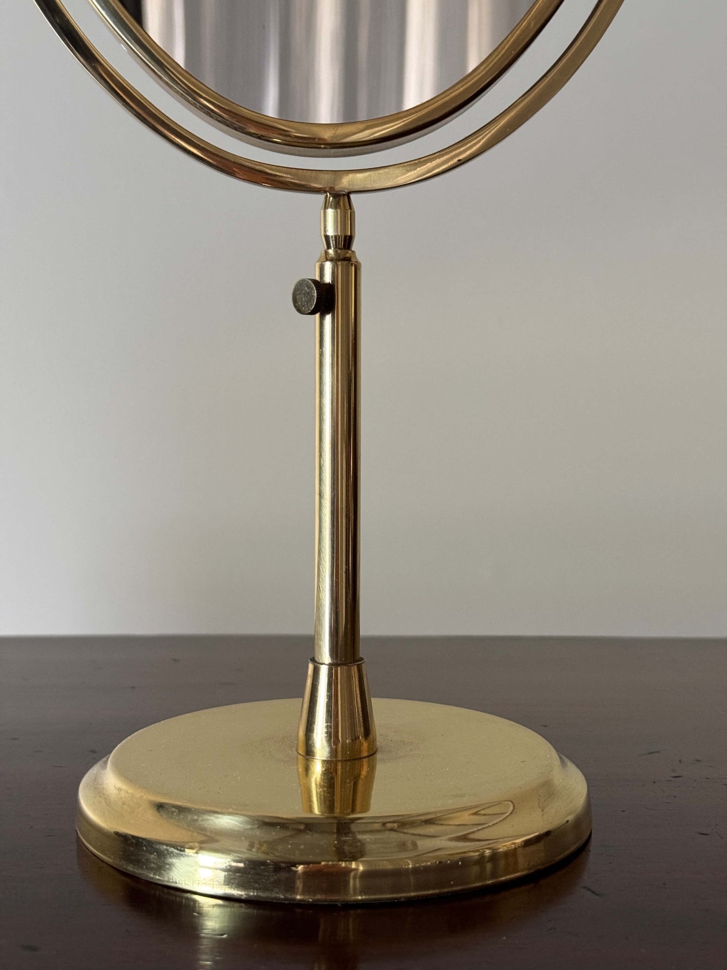 Small mid-century brass vanity mirror