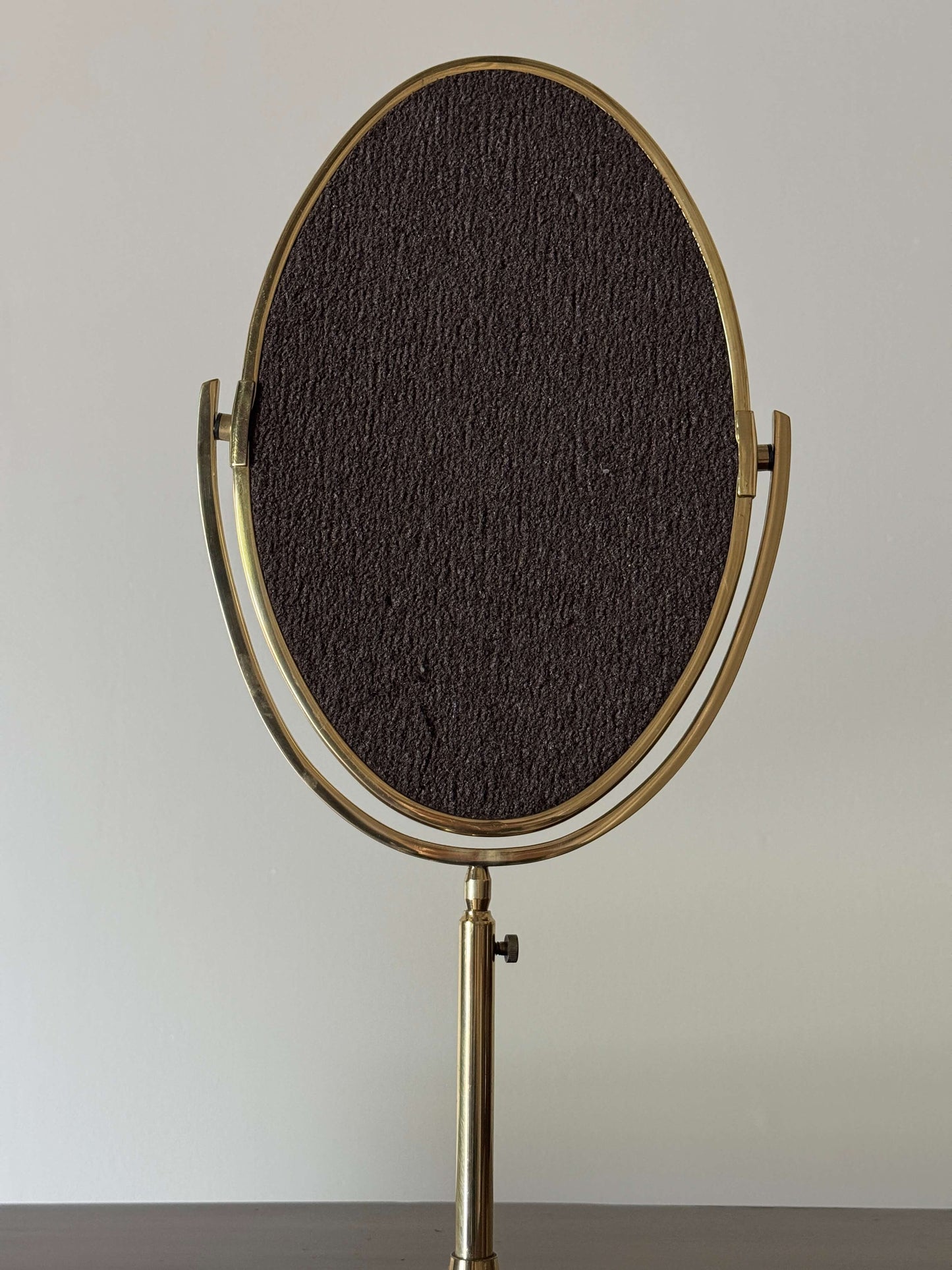 Small mid-century brass vanity mirror