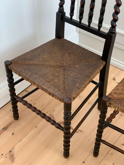 Pair of French antique rush bobbin chairs