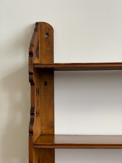 Antique shelf with scalloped detail