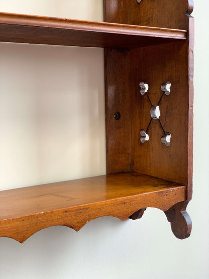 Antique shelf with scalloped detail