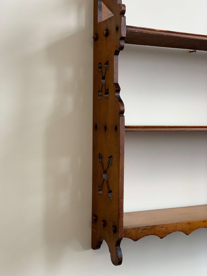 Antique shelf with scalloped detail